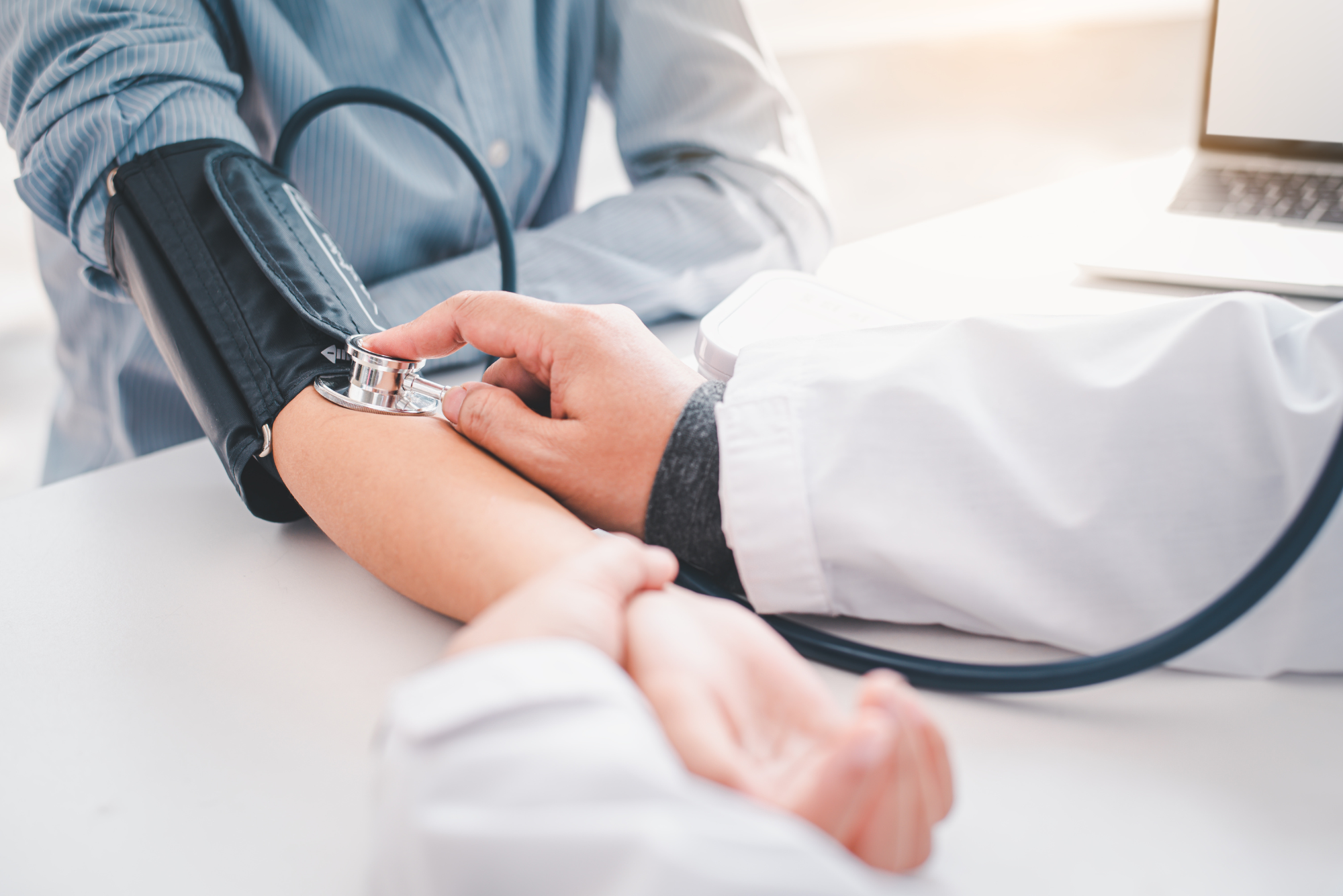 A patient having their blood pressure checked to see how long blood pressure medicine takes to work.