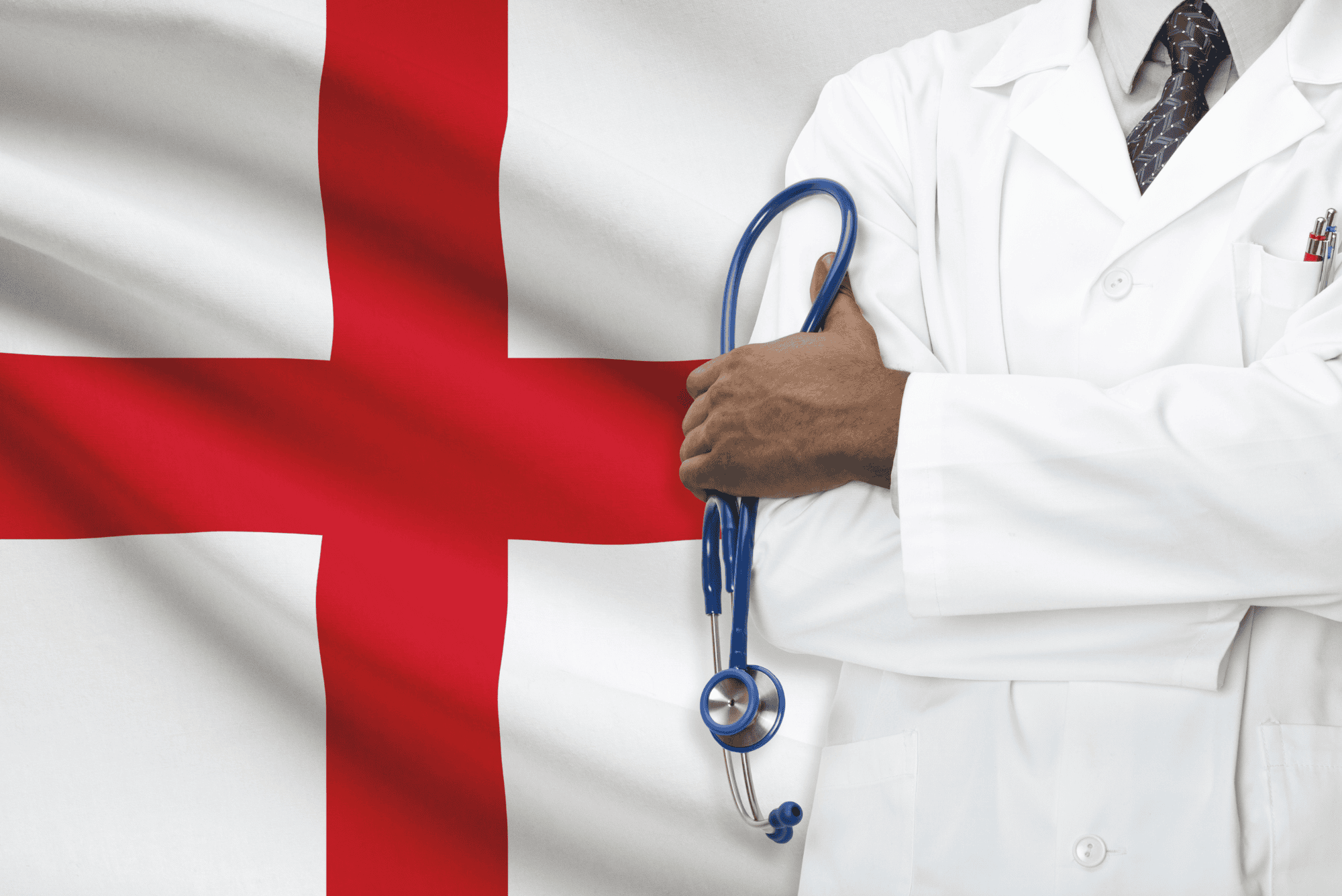 Doctor in a white coat holding a stethoscope against the England flag, referencing the NHS study on the Galleri test.